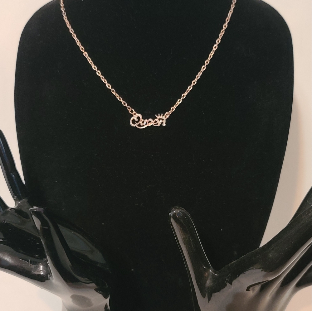 Gold tone chain necklace with Queen charm size
